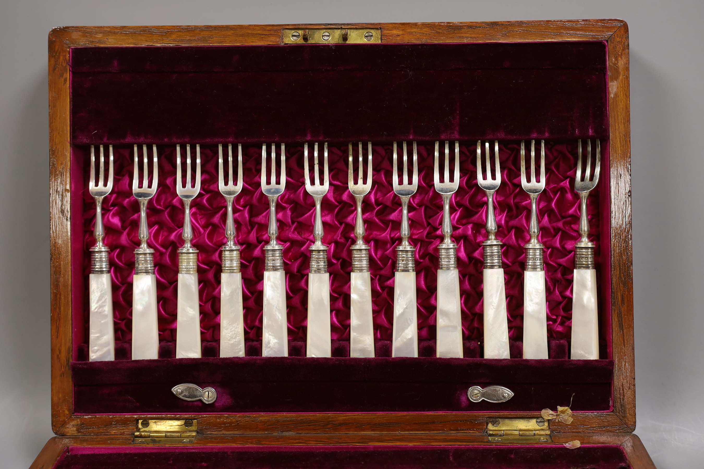 A cased set of late Victorian and later silver and mother of pearl handled dessert eaters, Martin, Hall & Co, Sheffield, 1897/19092/1903